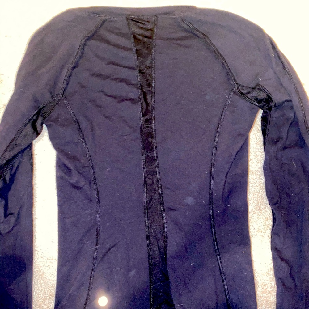 Rulu running shirt with lace detail on back.